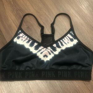 Pink bra in size medium. the dye design with pads. the elastic had “pink” on it.